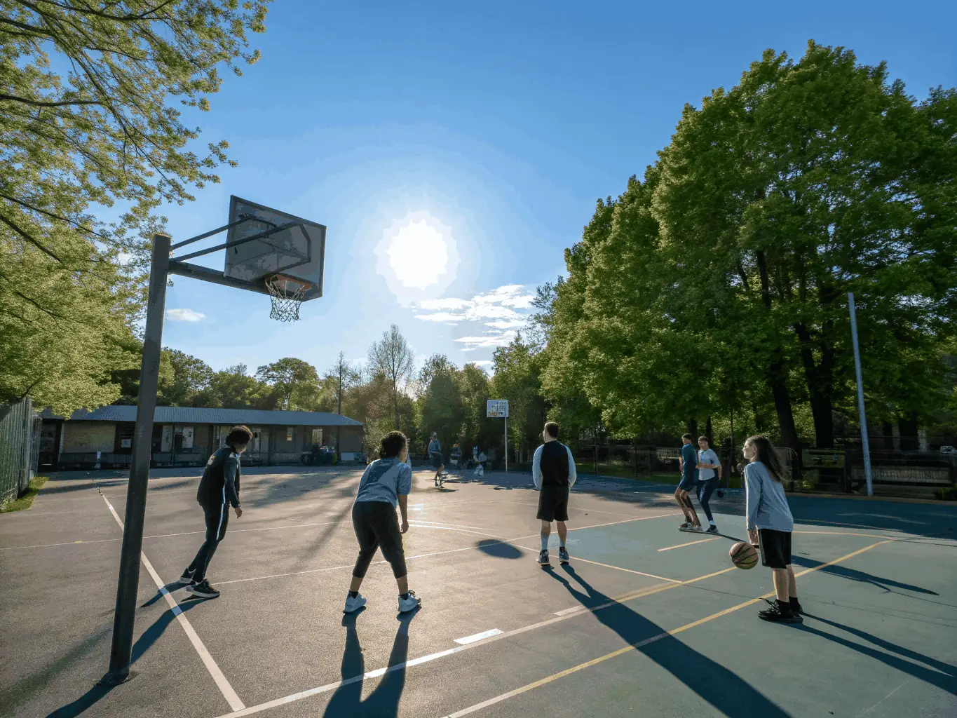 A vibrant image of students participating in a basketball game during a UNSS-organized event, showcasing teamwork and sportsmanship.